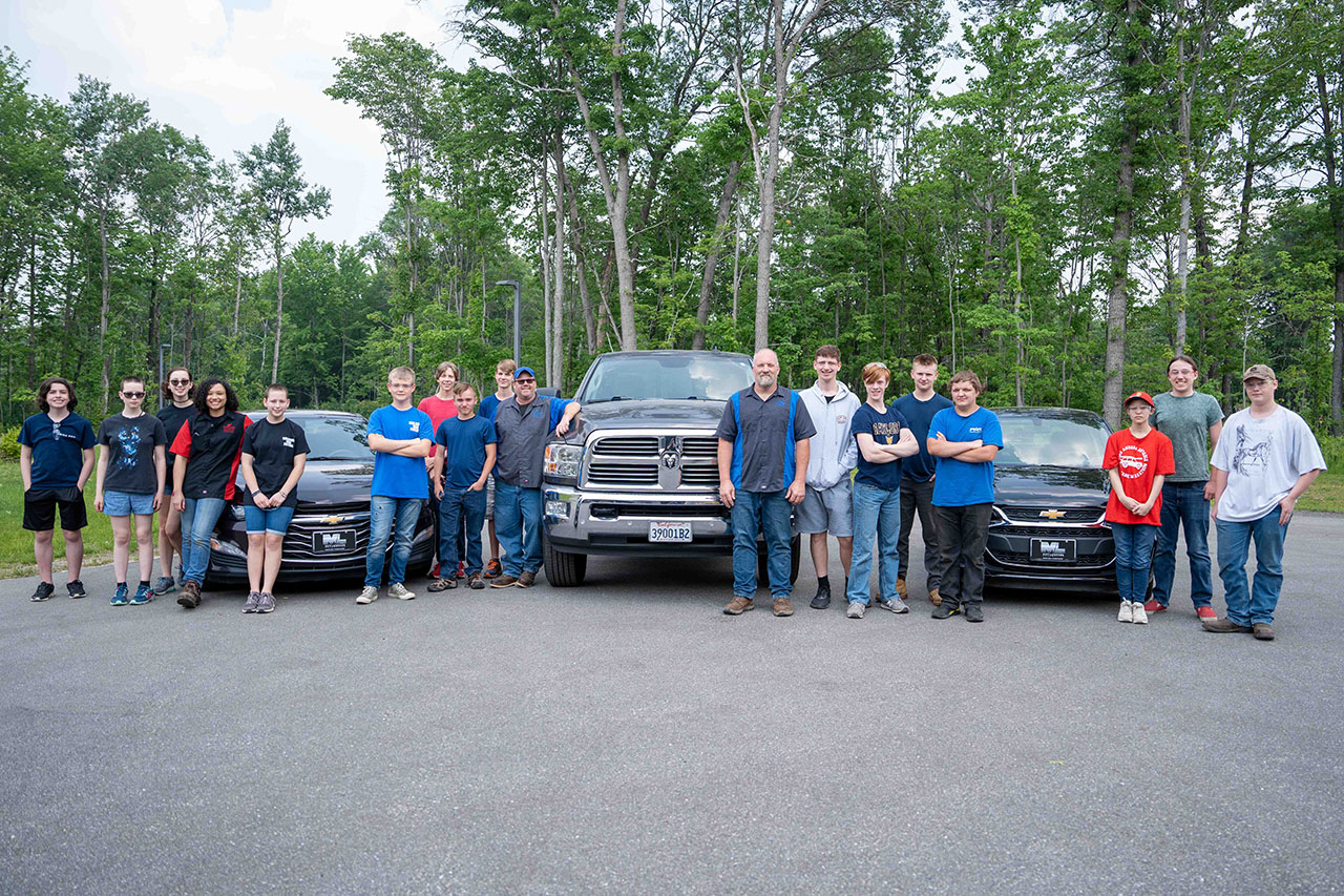 Automotive Technology instructors and students from local area high schools